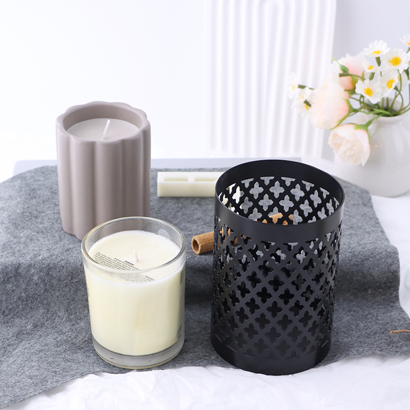 Modern Black Metal Candle Holder with Carved Design