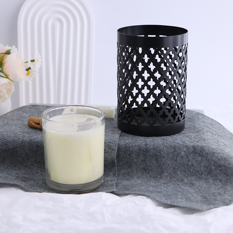 Modern Black Metal Candle Holder with Carved Design